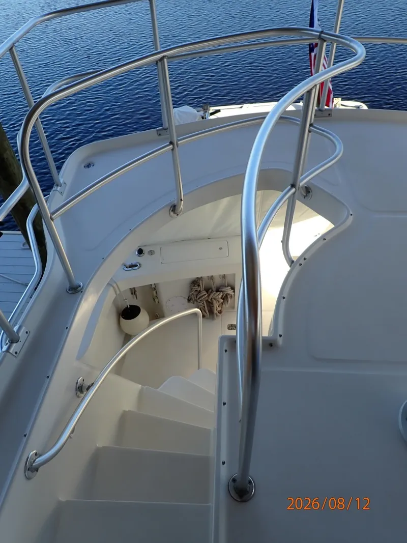 Slide: The Image of 39' Mainship flybridge-aftdeck stairs - 7459921