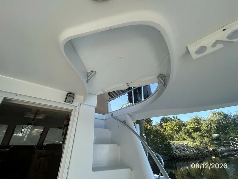 Slide: The Image of 39' Mainship aftdeck-flybridge stairs cover1 - 7459899