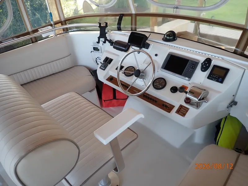 Slide: The Image of 39' Mainship flybridge helm2 - 7459912