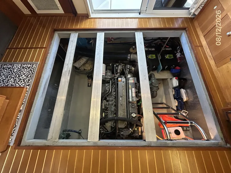 Slide: The Image of 39' Mainship engine room access - 7459908