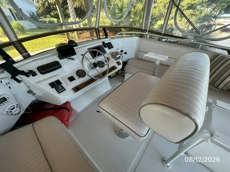 Slide: The Image of 39' Mainship flybridge helm1 - 7459911