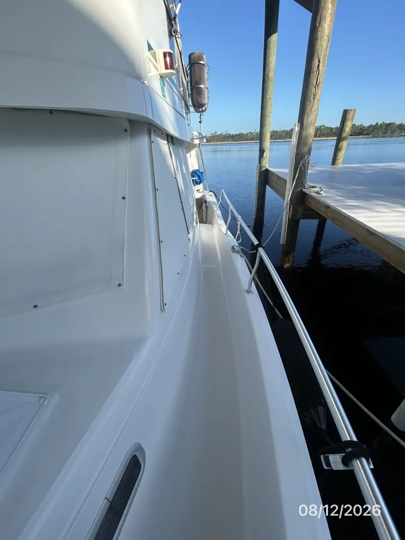 Slide: The Image of 39' Mainship port side deck1 - 7459945