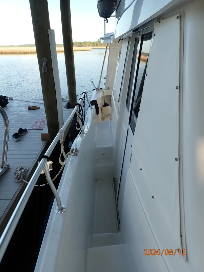 Slide: The Image of 39' Mainship starboard side deck1 - 7459956