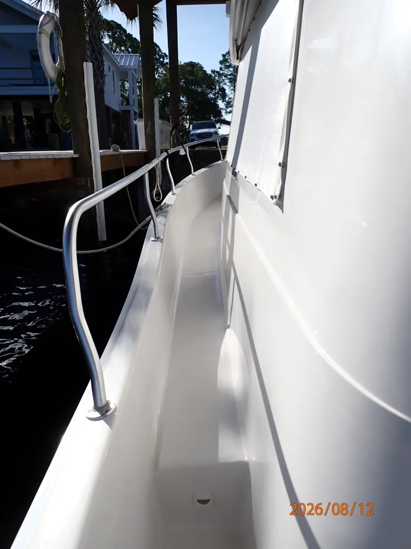 Slide: The Image of 39' Mainship port side deck2 - 7459946
