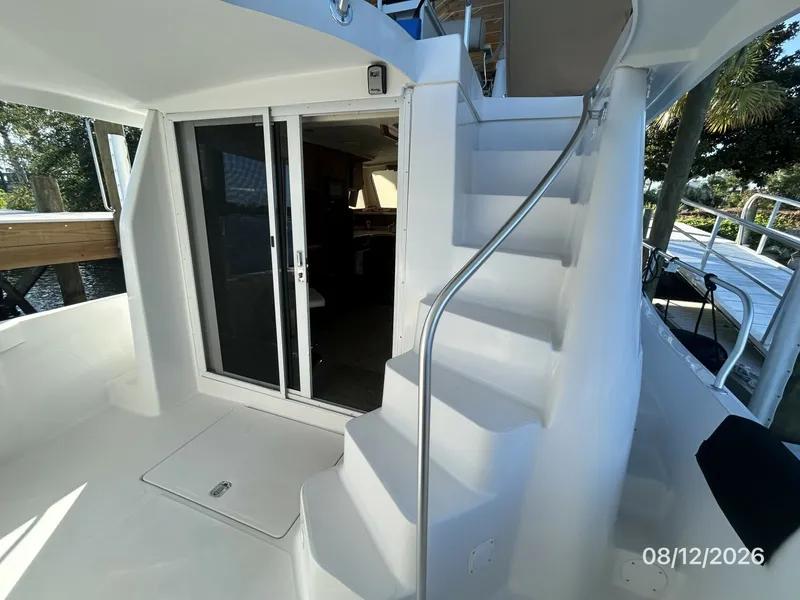 Slide: The Image of 39' Mainship aftdeck forward - 7459894
