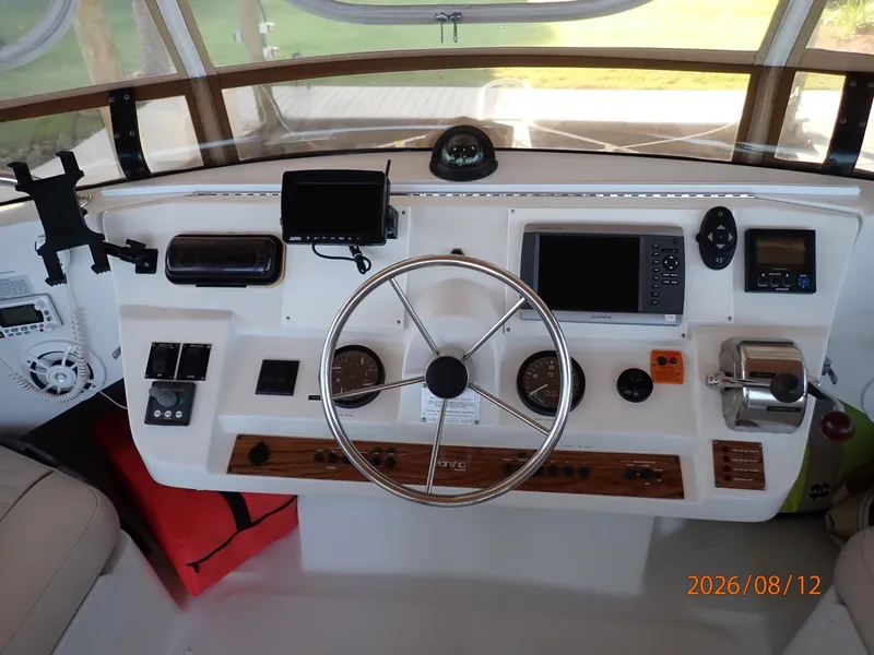 Slide: The Image of 39' Mainship flybridge helm3 - 7459913
