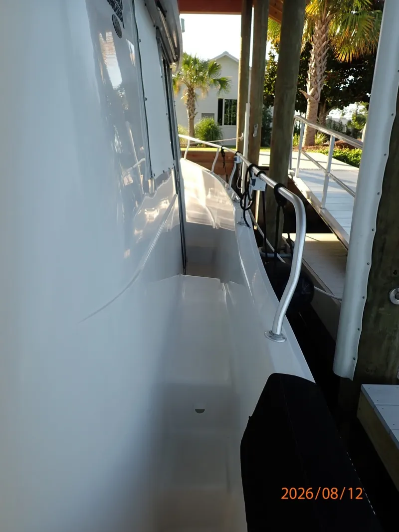 Slide: The Image of 39' Mainship starboard side deck2 - 7459957