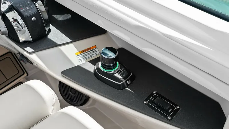 Slide: The Image of Helm Control Station The helm control station of the 2019 Boston Whaler 320 Vantage features state-of-the-art controls and ergonomic design. The joystick and throttle controls are intuitively positioned for seamless navigation, complemented by a sleek, modern dashboard. This - 7469839
