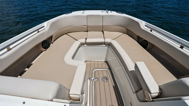 Slide: The Image of Spacious Bow Seating Area The bow of the 2019 Boston Whaler 320 Vantage features a luxurious and spacious seating area, perfect for relaxation and socializing. The plush, wrap-around seating is upholstered in premium materials, offering comfort and style. Ample storage is availabl - 7469831