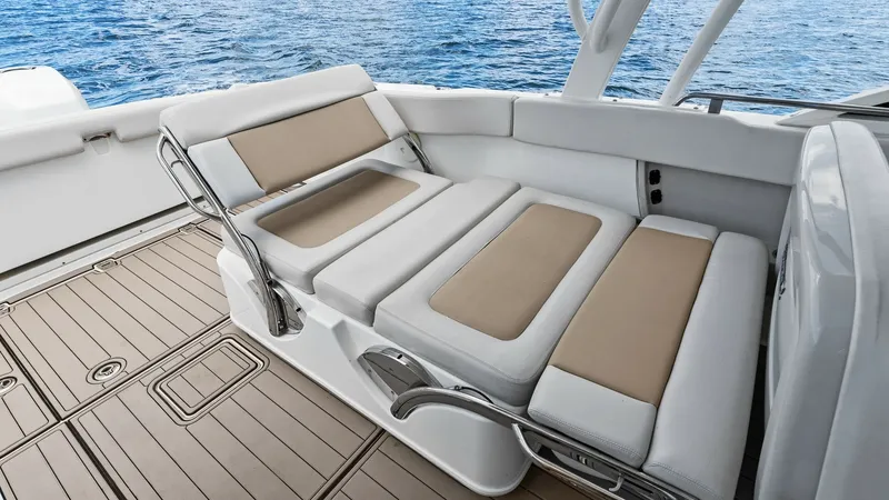 Slide: The Image of Convertible Aft Lounge Seating Area The convertible aft lounge on the 2019 Boston Whaler 320 Vantage offers versatile seating arrangements with plush, two-tone cushions for maximum comfort. The sleek design allows for easy transition between lounging and seating, making it ideal for enterta - 7469825