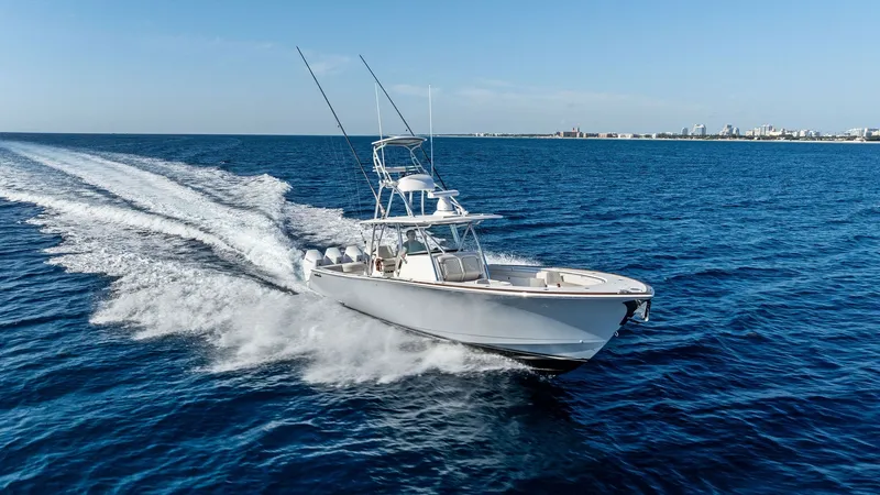 Slide: The Image of Valhalla V-41 in Action The 2025 Valhalla V-41, manufactured by Valhalla Boatworks, is captured slicing through the water with impressive agility. Its sleek hull design ensures a smooth and efficient ride, while the dual tower setup offers excellent visibility for both navigatio - 7517277