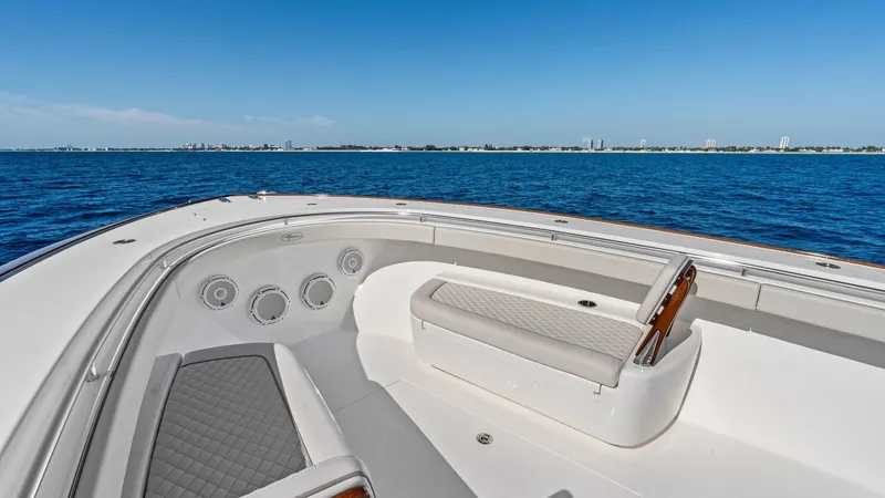 Slide: The Image of Spacious Bow Seating Area The bow of the 2025 Valhalla Boatworks V-41 features a spacious seating area with plush, diamond-stitched upholstery for ultimate comfort. Integrated speakers and sleek railings enhance the luxury experience, while the open layout provides unobstructed vi - 7517248