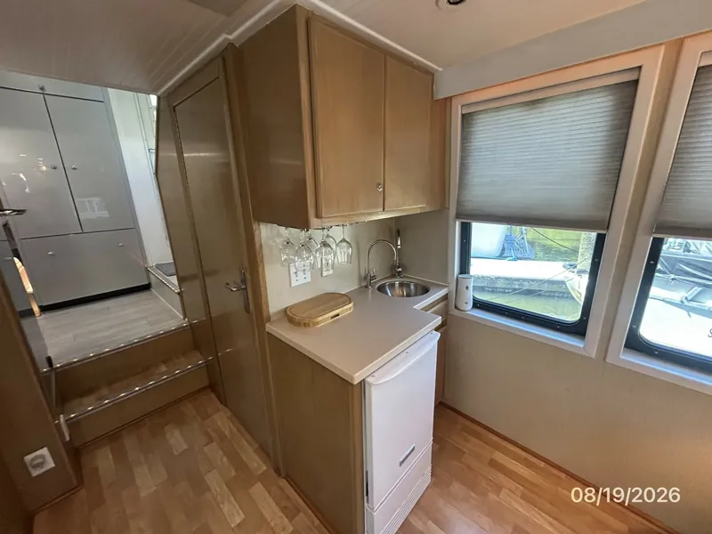 Slide: The Image of Steel Magnolia salon starboard forward wetbar - 7522108