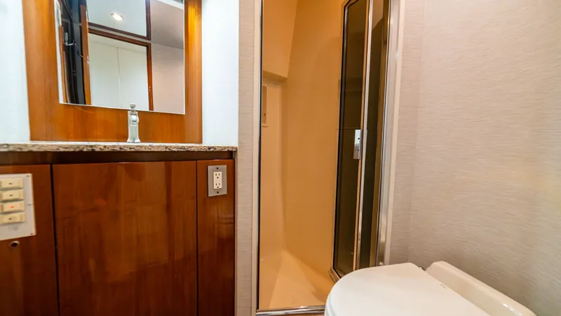 Slide: The Image of 2001 Viking 61 Convertible- Caliente- Guest Stateroom Head - 7606826