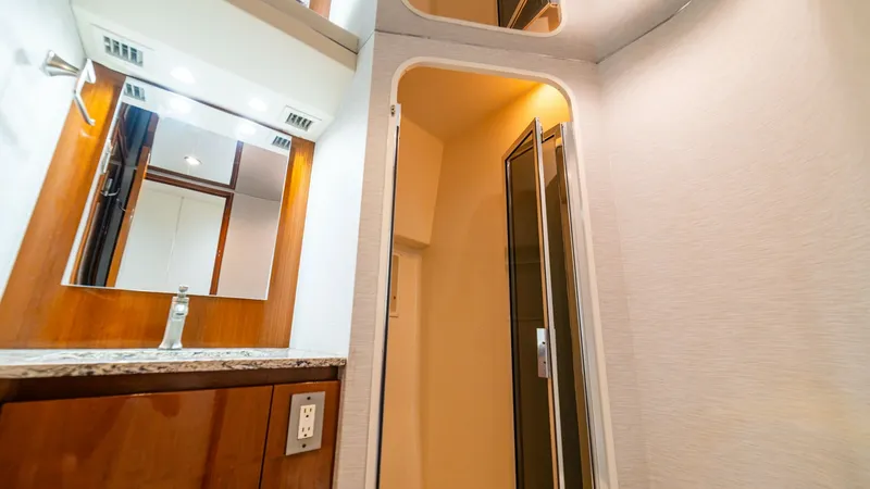 Slide: The Image of 2001 Viking 61 Convertible- Caliente- Guest Stateroom Head - 7606825