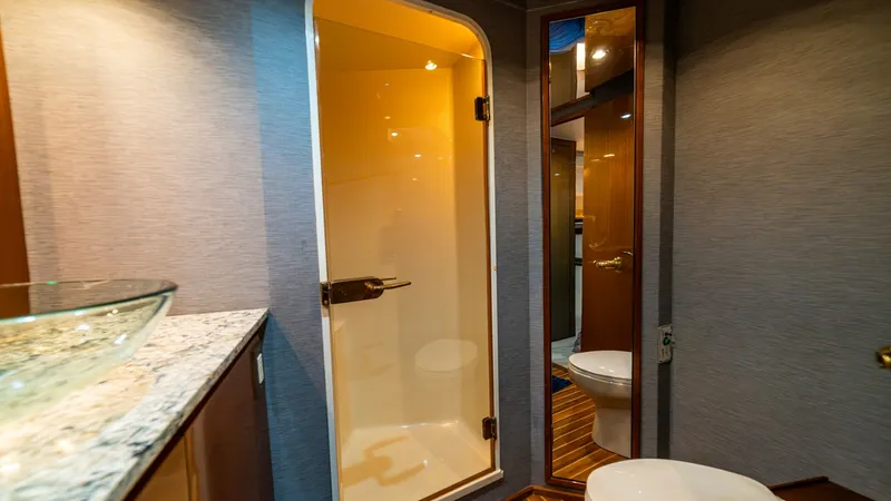 Slide: The Image of 2001 Viking 61 Convertible- Caliente- Master Stateroom Head - 7606809