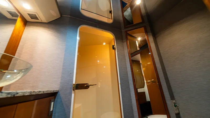 Slide: The Image of 2001 Viking 61 Convertible- Caliente- Master Stateroom Head - 7606810