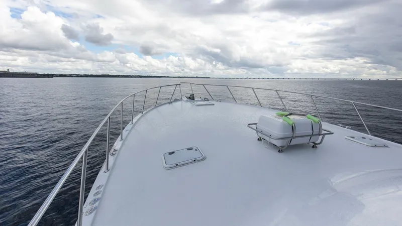Slide: The Image of 1999 Hatteras 60 Enclosed Bridge Better Days Bow Deck (2) - 7956962