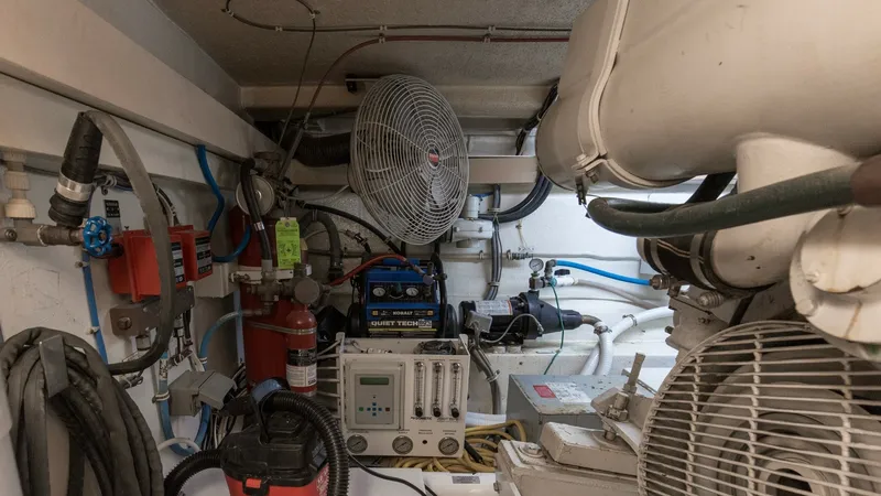 Slide: The Image of 1999 Hatteras 60 Enclosed Bridge Better Days Engine Room (6) - 7956975