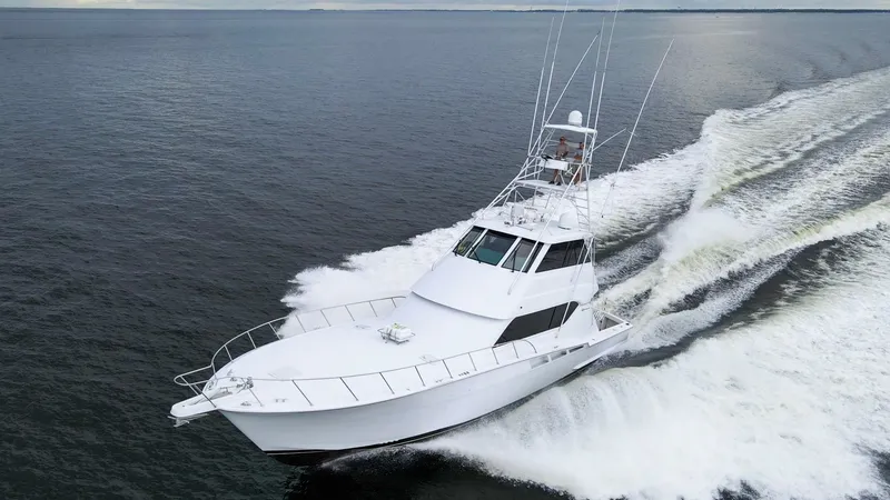 Slide: The Image of 1999 Hatteras 60 Enclosed Bridge Better Days Exteriors (4) - 7956986