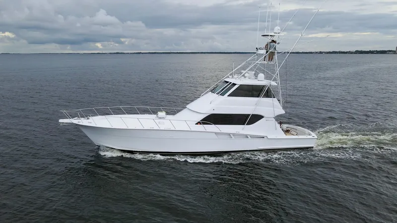 Slide: The Image of 1999 Hatteras 60 Enclosed Bridge Better Days Exteriors (5) - 7956987