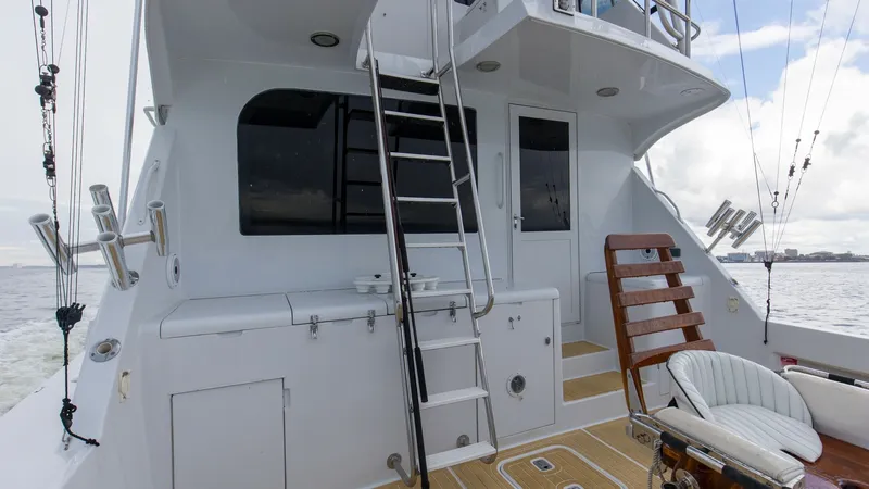 Slide: The Image of 1999 Hatteras 60 Enclosed Bridge Better Days Rear Deck (3) - 7956965