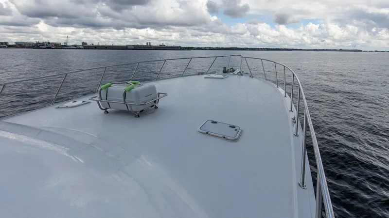 Slide: The Image of 1999 Hatteras 60 Enclosed Bridge Better Days Bow Deck - 7956963
