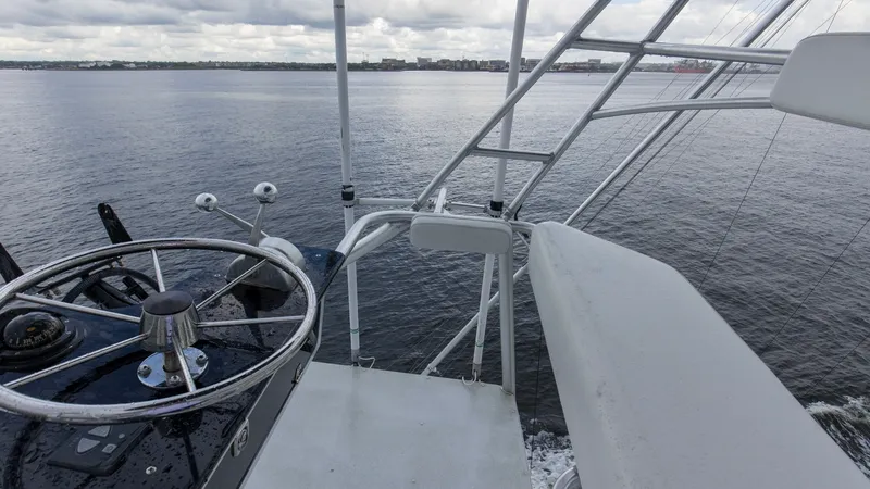 Slide: The Image of 1999 Hatteras 60 Enclosed Bridge Better Days Tower Helm (1) - 7956958