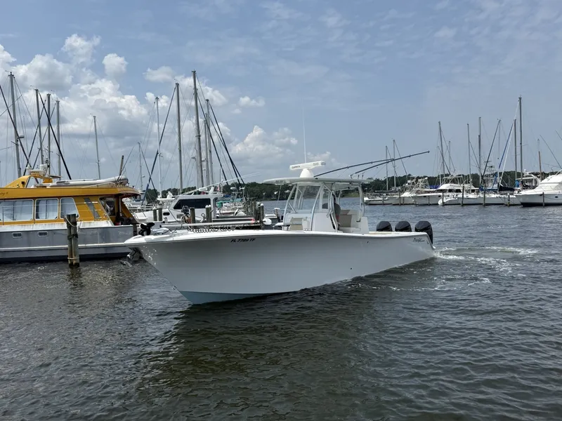 Slide: The Image of Front Runner 33 Center Console Running Profile Starboard running profile of the Front Runner 33 Center Console, showcasing premium lines and hardtop styling. - 7589627