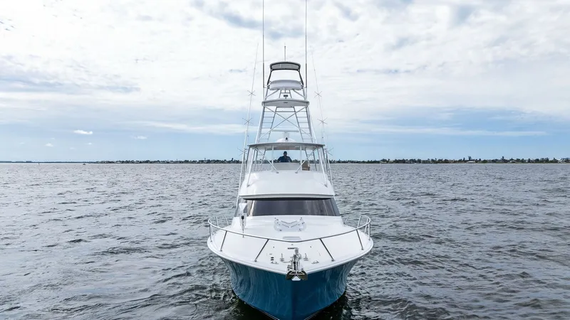 Slide: The Image of Bow View with Tower This striking bow view of the 2013 Viking 55 Convertible showcases its sleek lines and robust tower, designed for optimal visibility during navigation and fishing. The clean, expansive deck provides ample space for maneuvering, while the elegant hull desi - 7962113