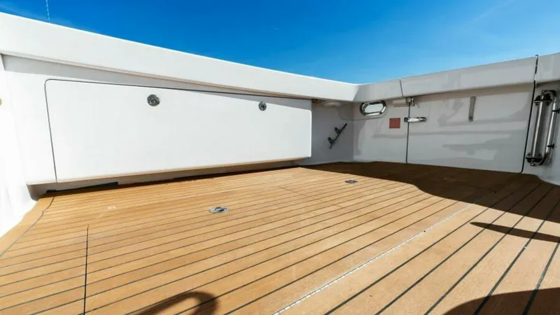 Slide: The Image of Spacious Teak Cockpit Deck The Viking 55 Convertible features a spacious teak cockpit deck, perfect for fishing or lounging. The clean lines and ample storage, including a tackle center, enhance functionality and ease of use. The robust construction and elegant finish make this an - 7594267
