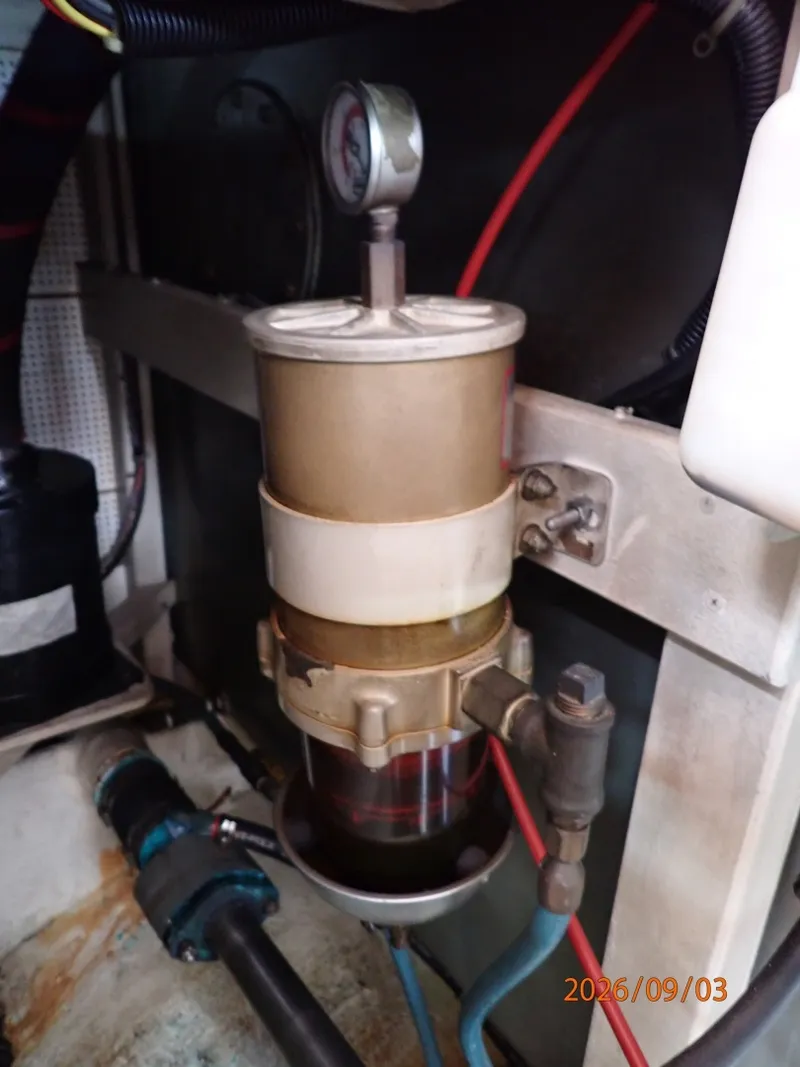 Slide: The Image of 42' Grand Banks port Racor fuel filter - 7602293
