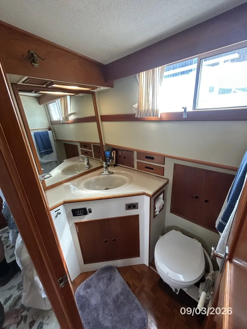 Slide: The Image of 42' Grand Banks master stateroom head - 7602279