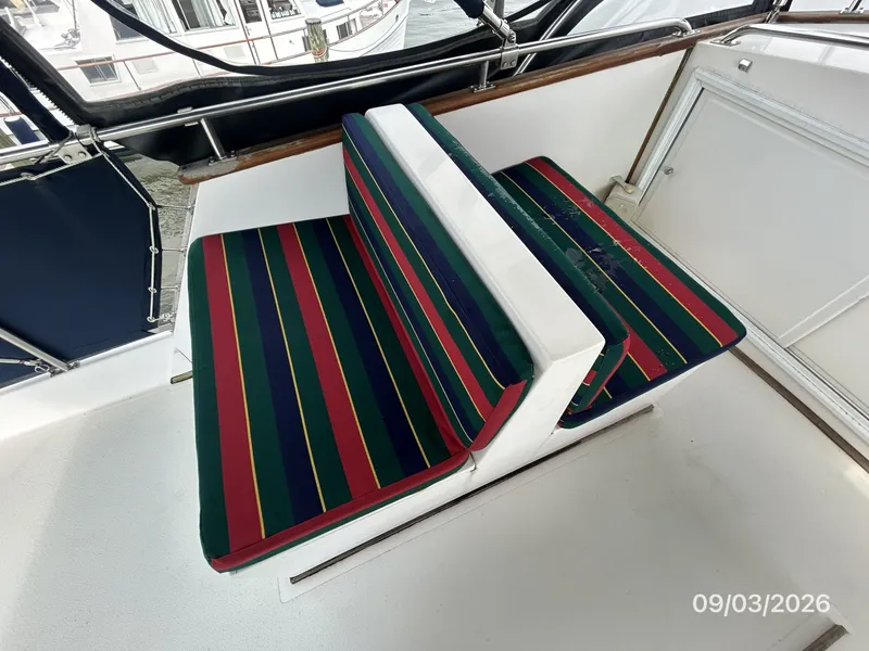 Slide: The Image of 42' Grand Banks flybridge port seating - 7602214
