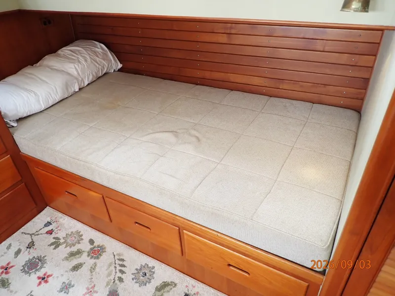 Slide: The Image of 42' Grand Banks master stateroom port berth - 7602283