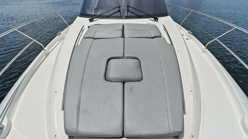 Slide: The Image of Spacious Sunpad on Bow Deck The bow of the 2015 Prestige 500 Fly features a luxurious sunpad, perfect for relaxing and enjoying the open water views. The cushioned area is spacious, offering ample room for multiple guests to lounge comfortably. This inviting space is ideal for sunba - 7603774