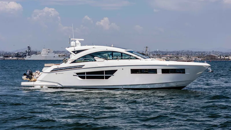 The Image of 2017 Cruisers 60 Cantius 'Rising Star' - Starboard Profile View at Sea The 2017 Cruisers 60 Cantius 'Rising Star' is showcased in a striking starboard profile view. Its sleek, modern design is highlighted by expansive windows that offer panoramic views and ample natural light. The vessel's elegant lines and contemporary silh - 7603840