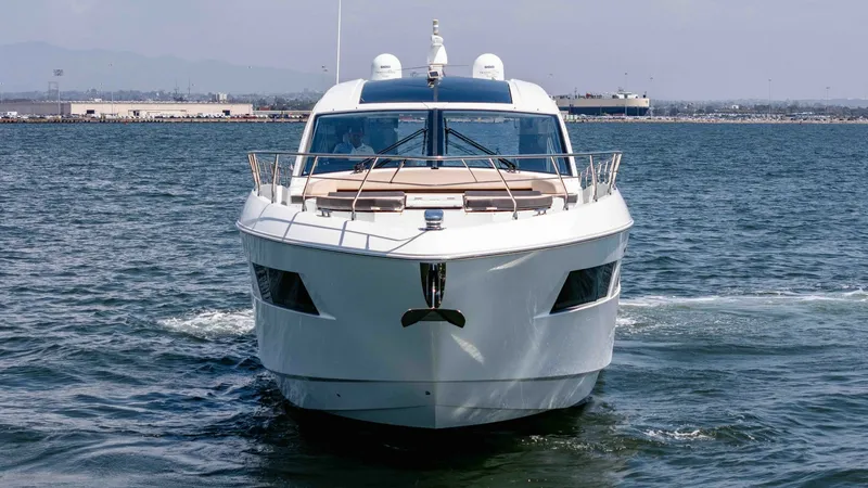 Slide: The Image of 2017 Cruisers 60 Cantius, 'Rising Star' Bow View This striking bow view of the 2017 Cruisers 60 Cantius 'Rising Star' showcases its sleek lines and modern design. The spacious sunpad area provides a luxurious space for relaxation while cruising, complemented by the yacht's elegant railings and large win - 7603883