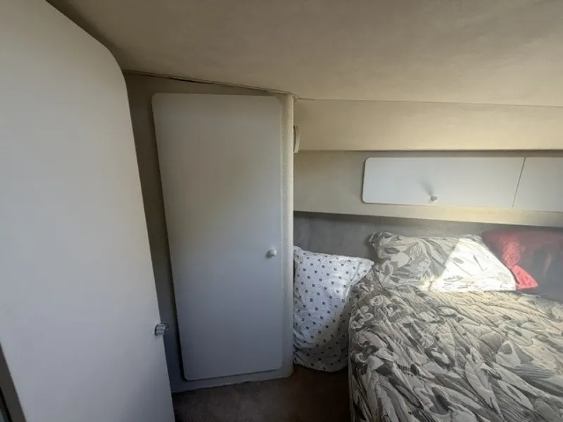 Slide: The Image of Forward state room port hanging locker - 7643922