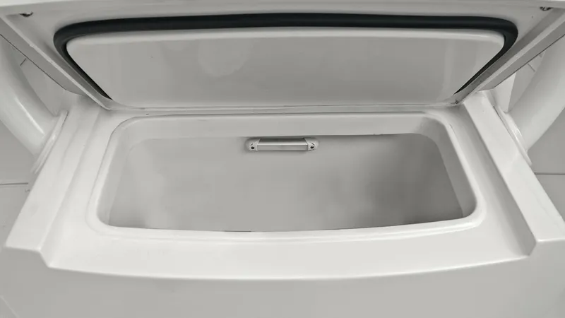 Slide: The Image of Spacious In-Deck Storage Compartment This image showcases the expansive in-deck storage compartment of the 2025 Jupiter 30 HFS. Designed for convenience, the compartment offers ample space for gear and essentials, making it ideal for extended trips. The sleek finish and durable construction - 7718729