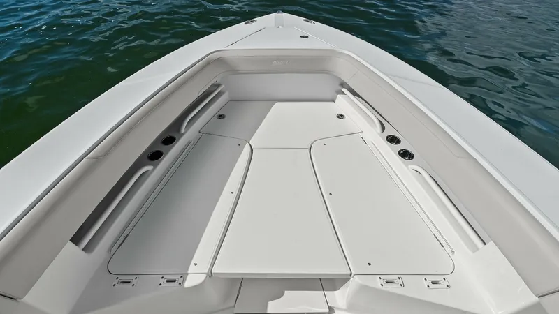 Slide: The Image of Spacious Bow Seating Area The 2025 Jupiter 30 HFS features a sleek and spacious bow seating area designed for comfort and versatility. The clean lines and ample seating provide a perfect spot for relaxation or socializing, enhanced by durable, high-quality materials. This area off - 7718730