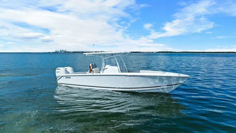 Slide: The Image of Side Profile of Jupiter 30 HFS The sleek side profile of the 2025 Jupiter 30 HFS is showcased against a serene seascape, highlighting its streamlined hull and modern design. The dual outboard engines promise powerful performance, perfect for both leisure cruising and sport fishing. The - 7718746
