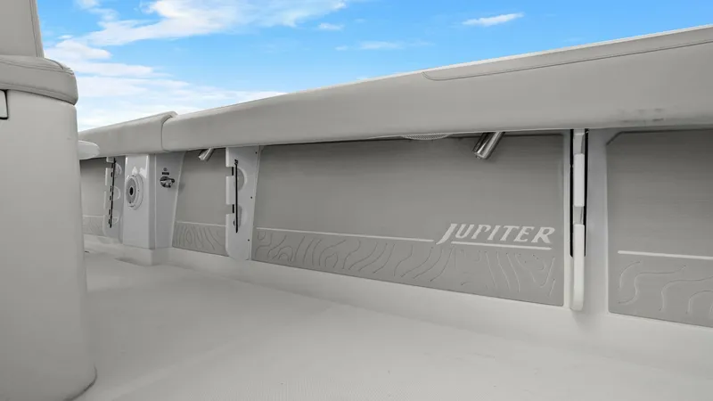 Slide: The Image of Starboard Side Storage Compartments The 2025 Jupiter 30 HFS features sleek starboard side storage compartments designed for easy access and optimal organization. The elegant finish showcases the Jupiter branding, adding a touch of sophistication. This practical space enhances the vessel's f - 7718734