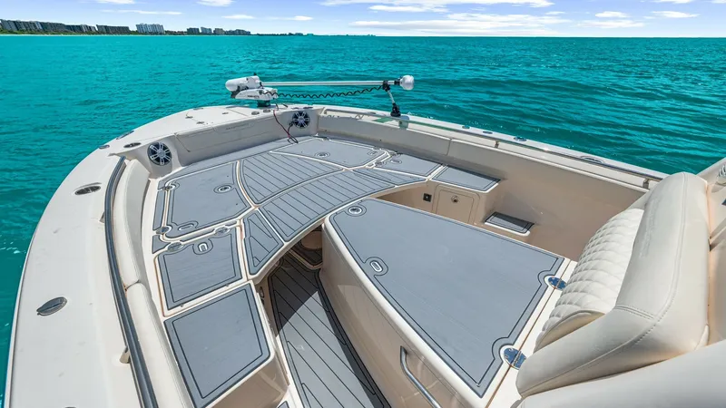 Slide: The Image of Spacious Bow with Seating The 2024 Grady-White 281 CE features a spacious bow area, perfect for relaxation and scenic views. The cushioned seating offers comfort, while the non-slip decking ensures safety. This well-designed space is ideal for enjoying the open water, with ample r - 7766887