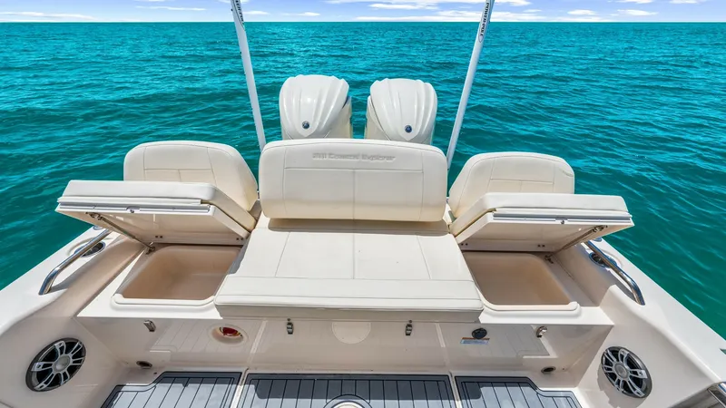 Slide: The Image of Spacious Aft Deck with Storage The 2024 Grady-White 281 CE features a versatile aft deck with ample storage options and comfortable seating. The fold-out compartments provide easy access to gear, while the sleek design ensures ample space for relaxation and activities. The twin outboar - 7766873