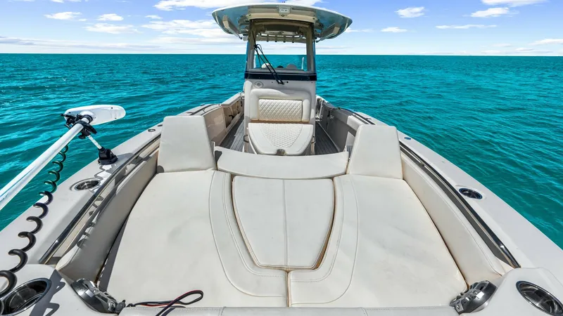 Slide: The Image of Spacious Bow Lounge Area The 2024 Grady-White 281 CE showcases a luxurious bow lounge area, perfect for relaxation and enjoying the open water. The plush seating is elegantly upholstered, providing comfort and style. This space is enhanced by high-quality finishes and a sleek des - 7766893