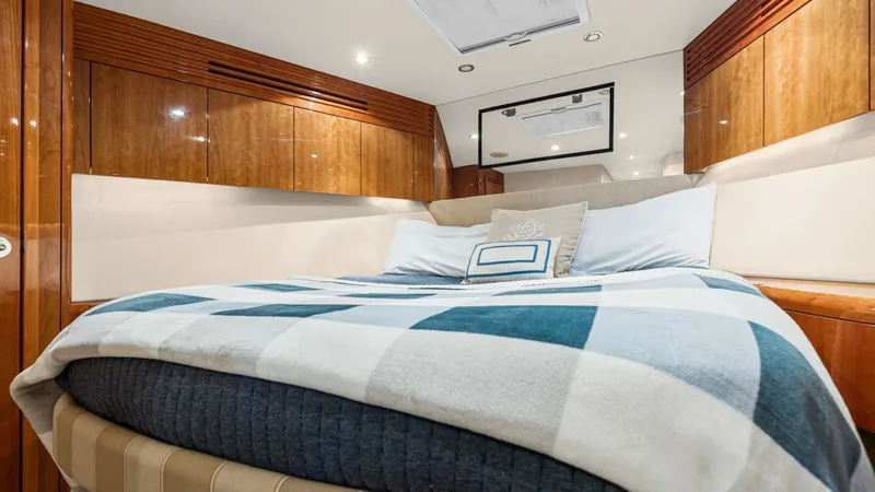 Slide: The Image of 2008 54 Hatteras Convertible American Made Forward Stateroom - 7852462