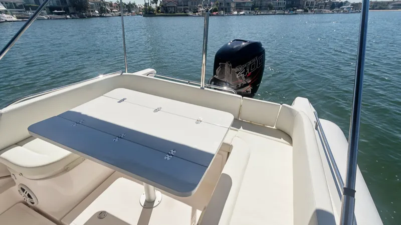 Slide: The Image of Spacious Aft Deck with Seating This inviting aft deck of the 2017 Zar Formenti 85 SL features a comfortable seating area with a versatile dining table, perfect for alfresco meals. The layout provides ample space for relaxation while enjoying scenic views. The outboard motor is convenie - 7766820