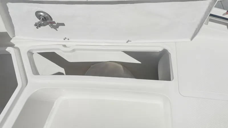 Slide: The Image of Spacious Storage Compartment This image showcases a spacious storage compartment on the Zar Formenti 85 SL, designed for practicality and convenience. The compartment features a secure latch system and ample space for stowing gear or personal items. Its clean, white finish complement - 7766831