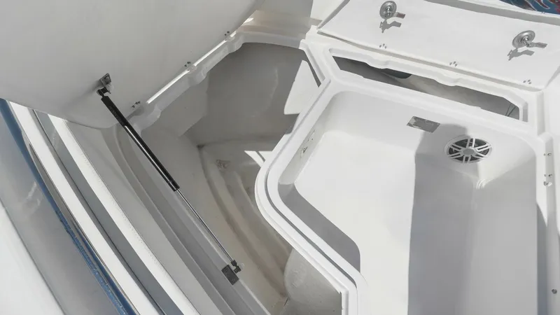 Slide: The Image of Spacious Bow Storage Compartment This image showcases the spacious bow storage compartment of the Zar Formenti 85 SL. Featuring robust hydraulic supports, it provides ample space for stowing gear securely. The compartment is designed with easy access and functional drainage, ideal for ke - 7766829